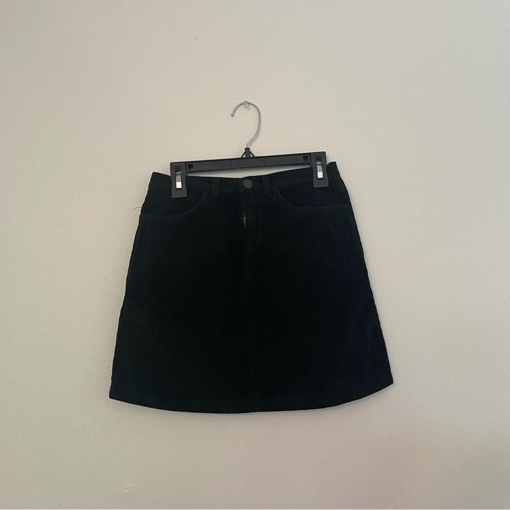 Brandy Melville black corduroy mini skirt. Fits like a S/XS.